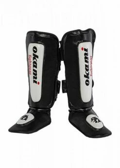 Okami DX Puppies Thai Shin Pads Nero-Bianco